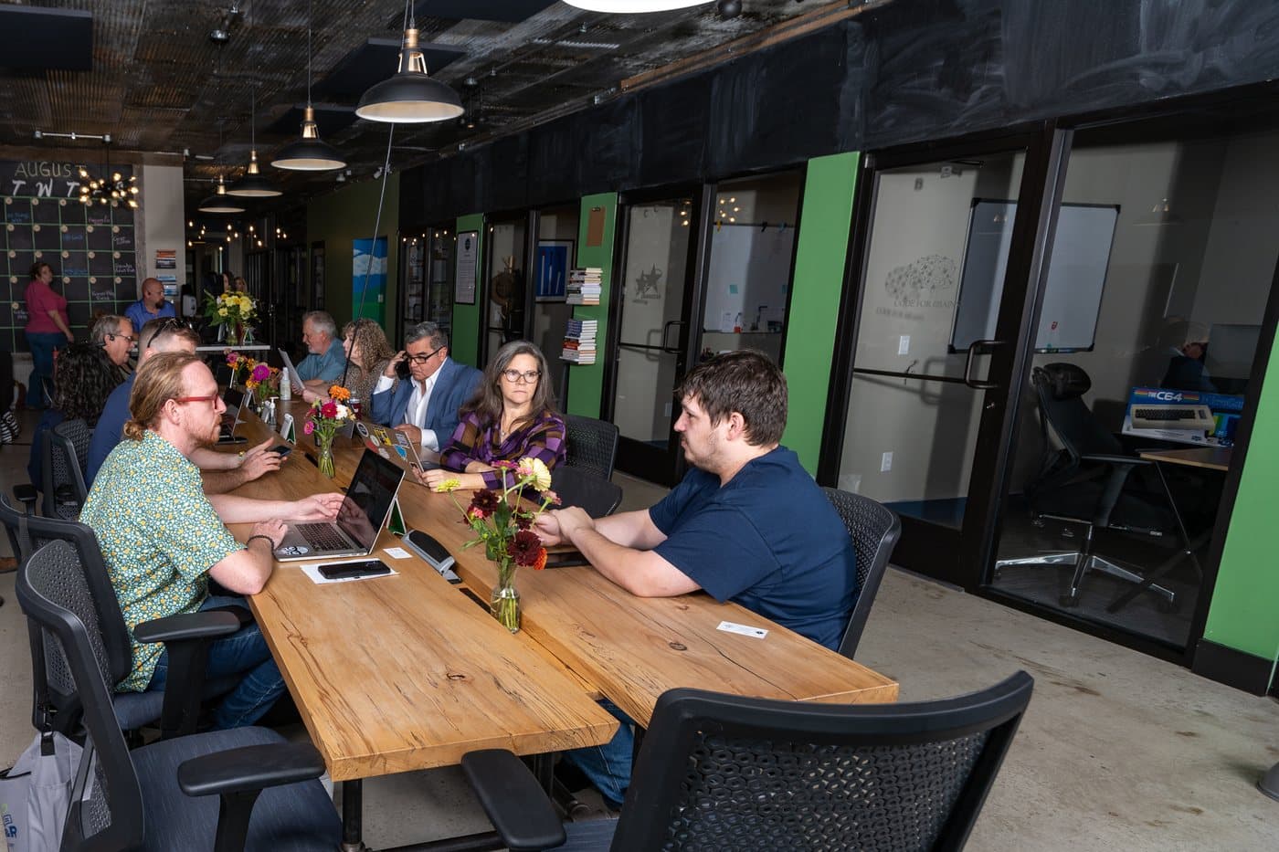Members working at desks on the main floor of WorkBase in Cookeville